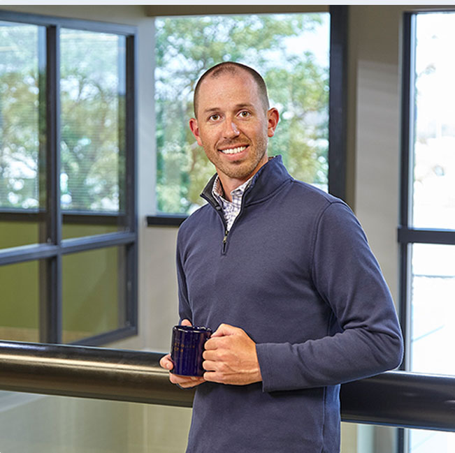 Employee smiling in office